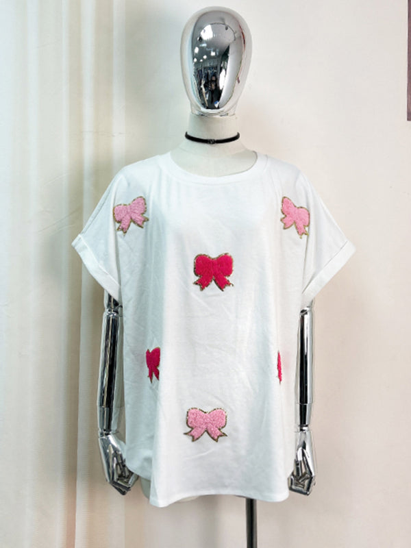 White Short-Sleeve Top with Embroidered Pink Sequin Bow Details - Image 3