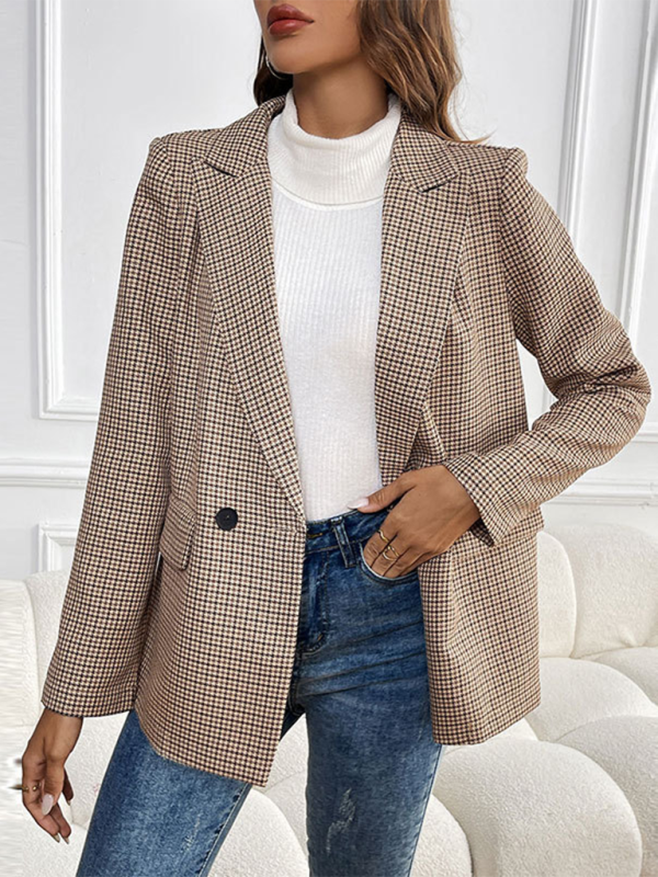 Model wearing a brown and black plaid blazer with lapel collar and button closure.