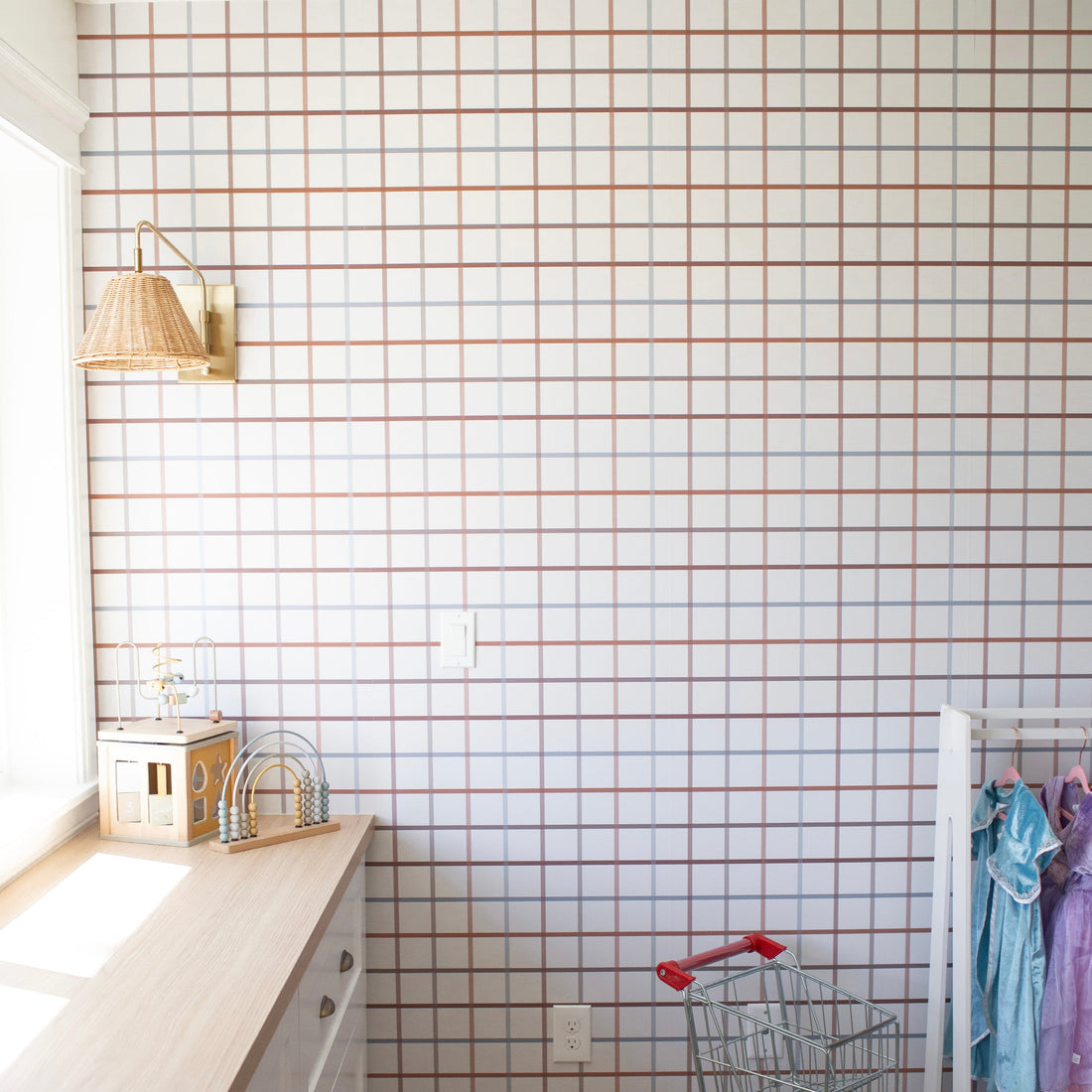 Matilda geometric wallpaper in white, brown, and blue colors for modern interior design