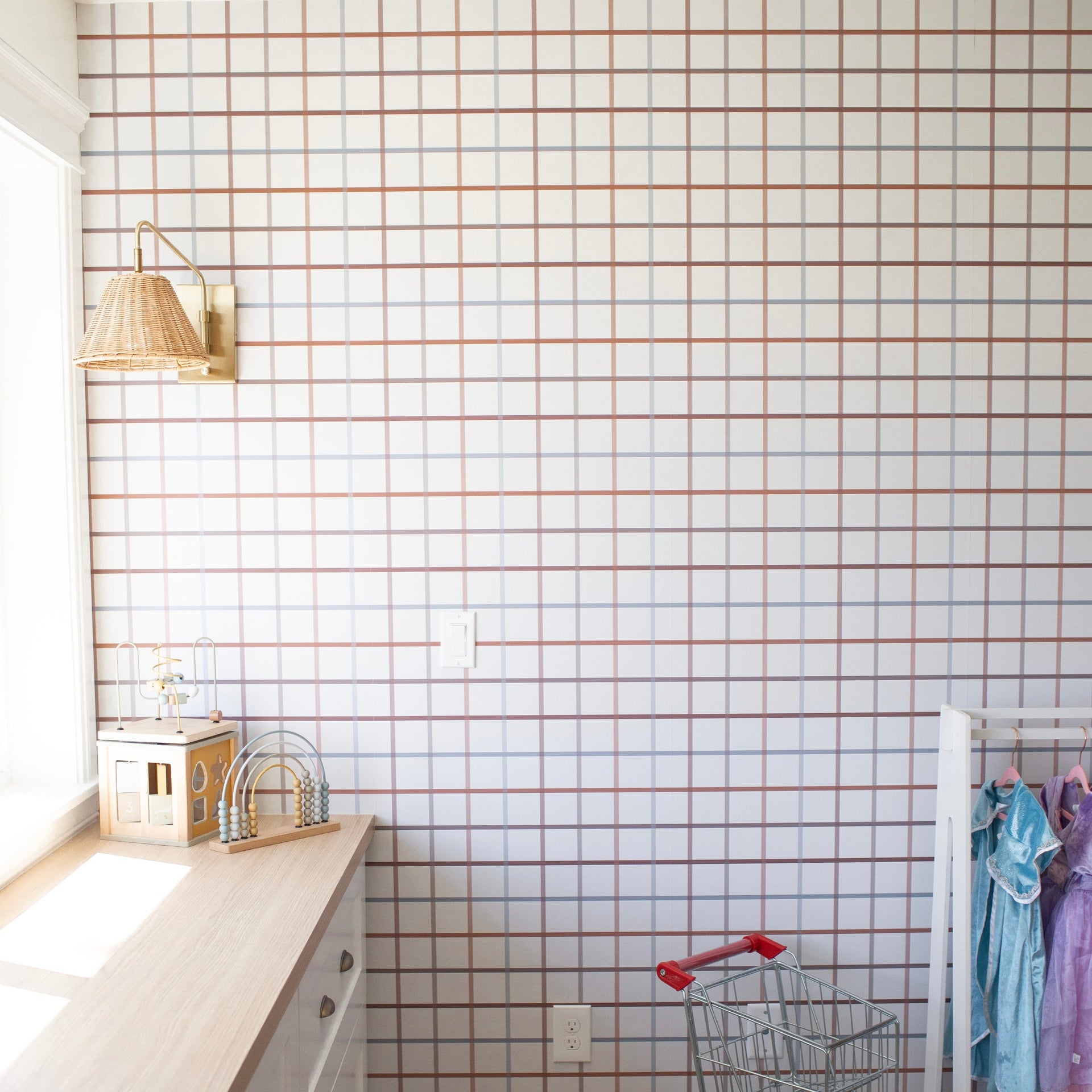 Matilda geometric wallpaper in white, brown, and blue colors for modern interior design