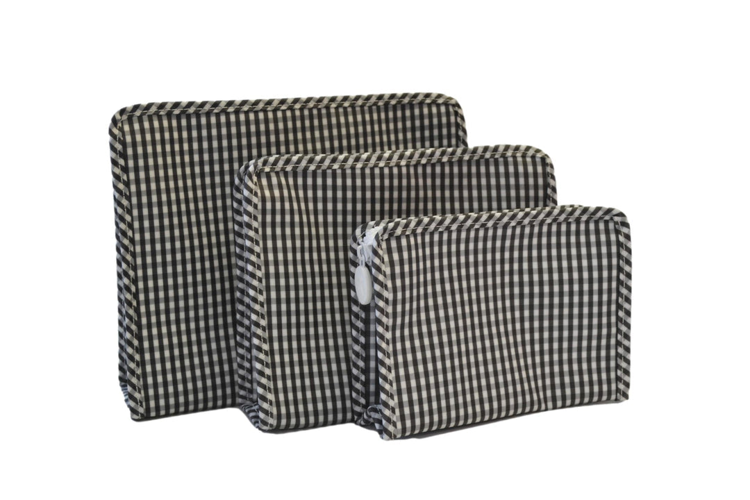 Three gingham-patterned pouches of different sizes on a white background