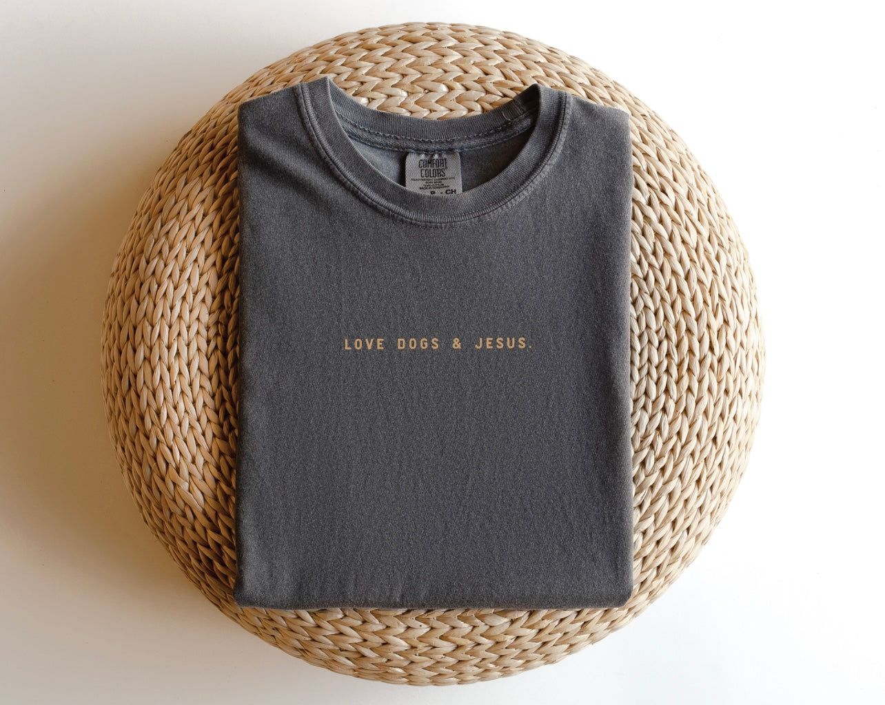 Charcoal grey Love Dogs + Jesus youth tee with a minimalist design.