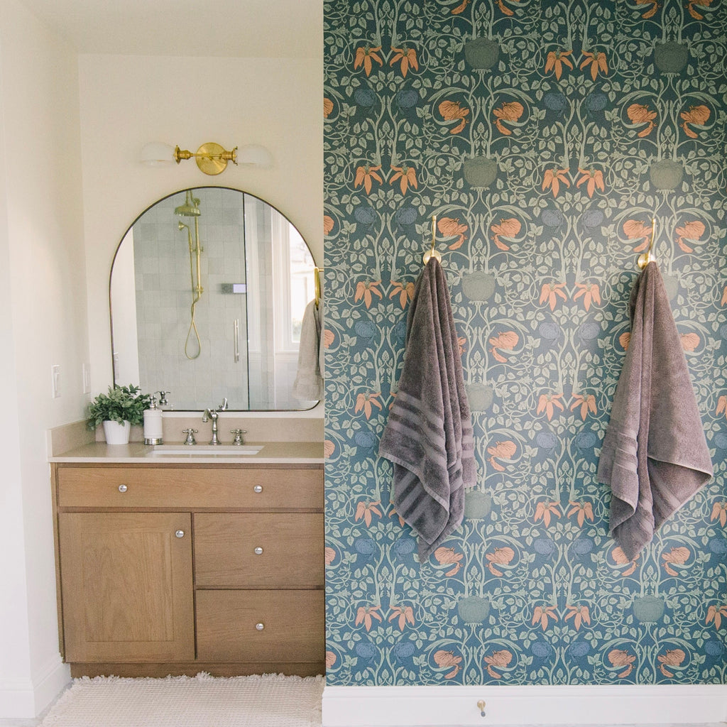 Whitney floral wallpaper featuring vintage arts and crafts aesthetic in teal and peach