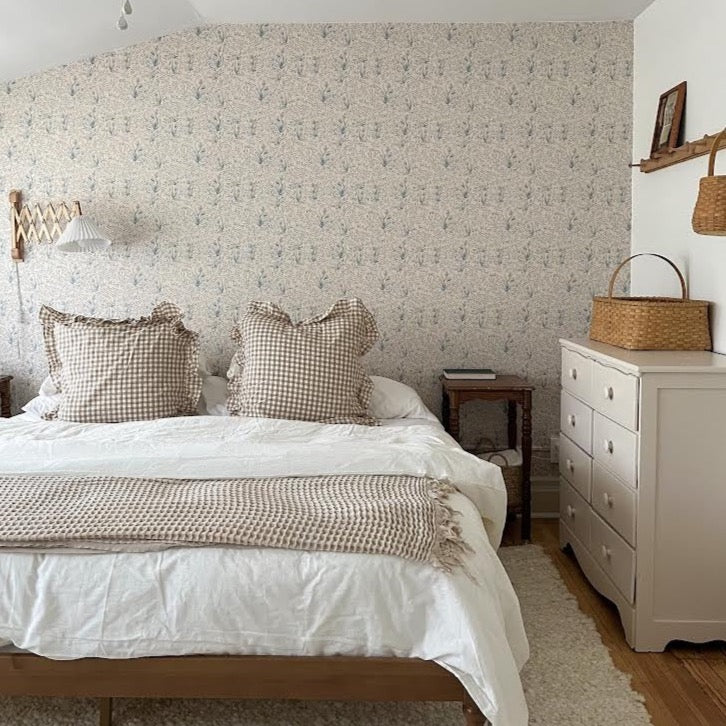 Austen floral wallpaper in white and blue featuring a romantic cottagecore aesthetic