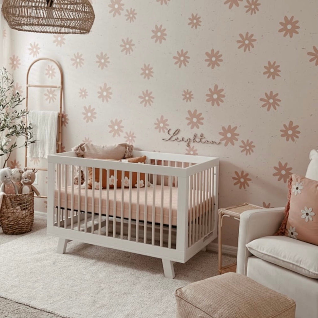 Avery floral wallpaper in dusty-rose and beige, perfect for a bohemian nursery