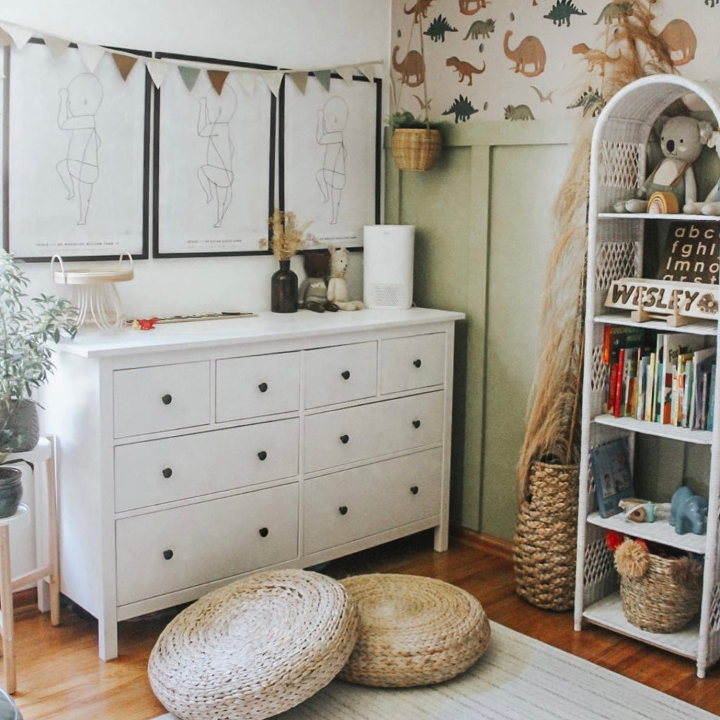 Tyran animal print wallpaper featuring sage green, beige, and terracotta tones