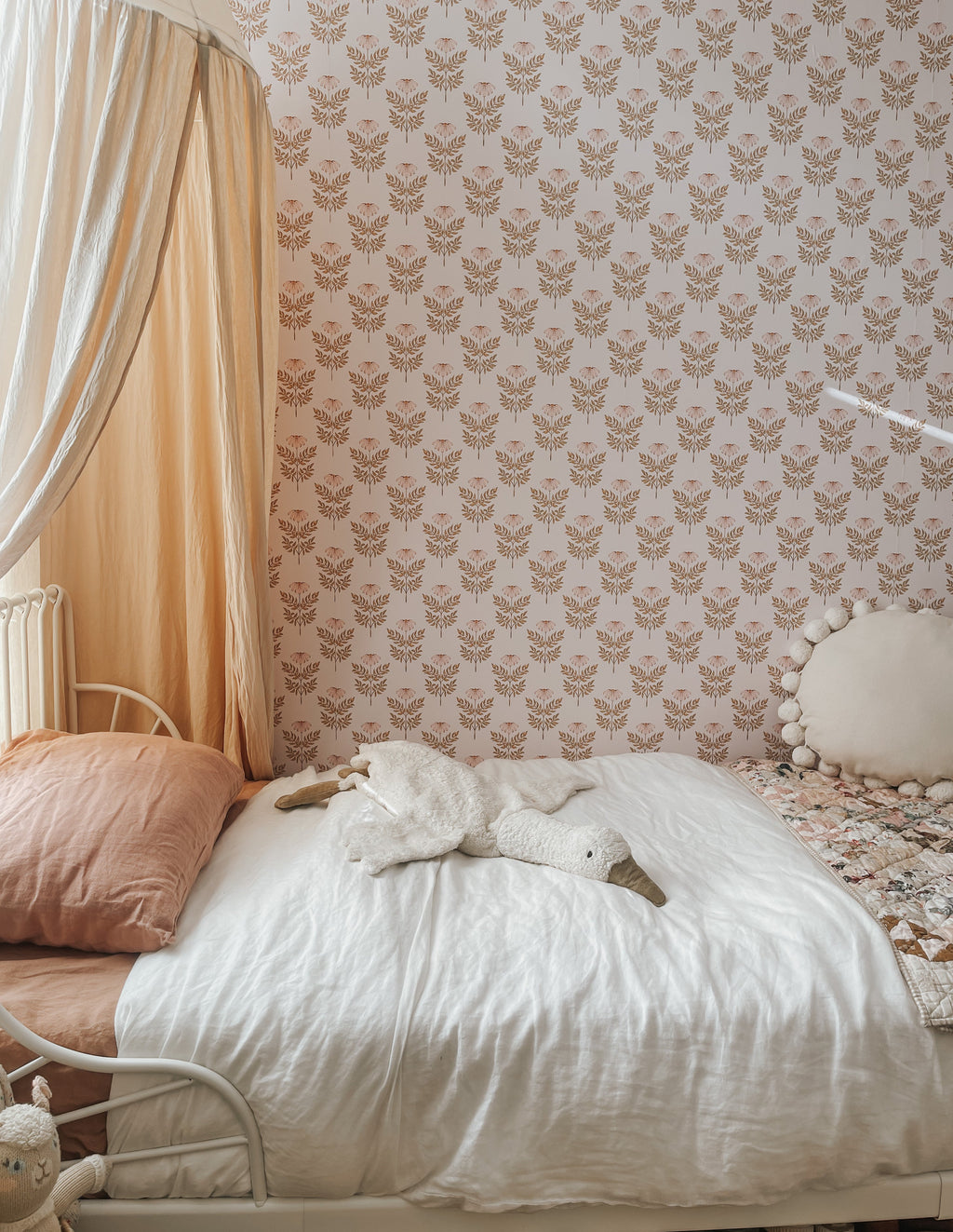 Prue floral wallpaper featuring blush pink and mustard yellow bohemian print