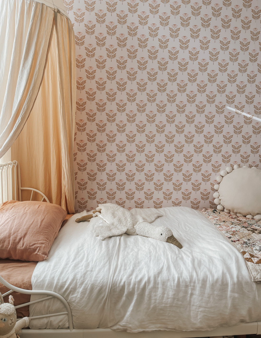 Prue floral wallpaper featuring blush pink and mustard yellow bohemian print