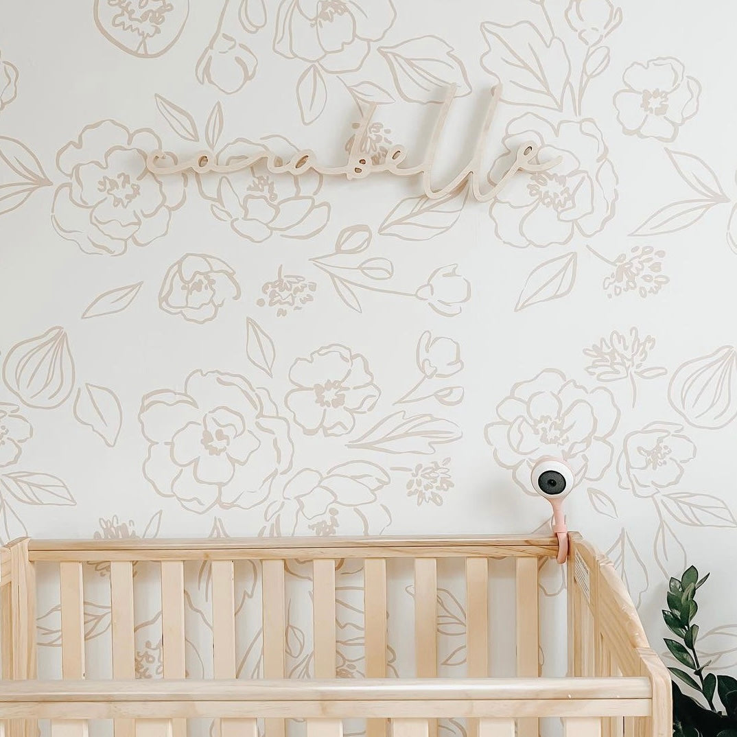 Tori floral wallpaper in calming cream and beige, minimalist aesthetic.