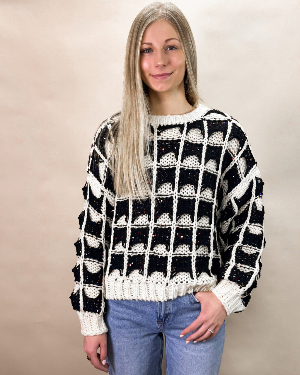 Black and ivory contrast square knitted sweater with unique knit pattern