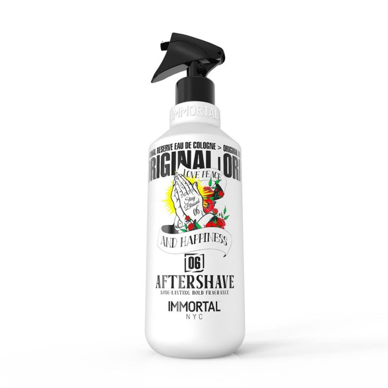 Immortal NYC Stay Blessed 06 Aftershave Cologne 16.9oz bottle in a professional barber setting