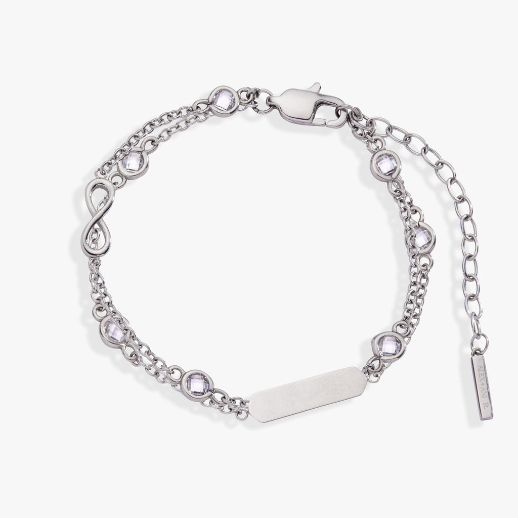 Double strand chain bracelet featuring infinity symbols and crystal stone accents.