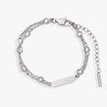 Double strand chain bracelet featuring infinity symbols and crystal stone accents.