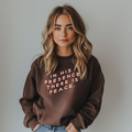 Chocolate brown women's pullover sweatshirt with In His Presence There is Peace text in white
