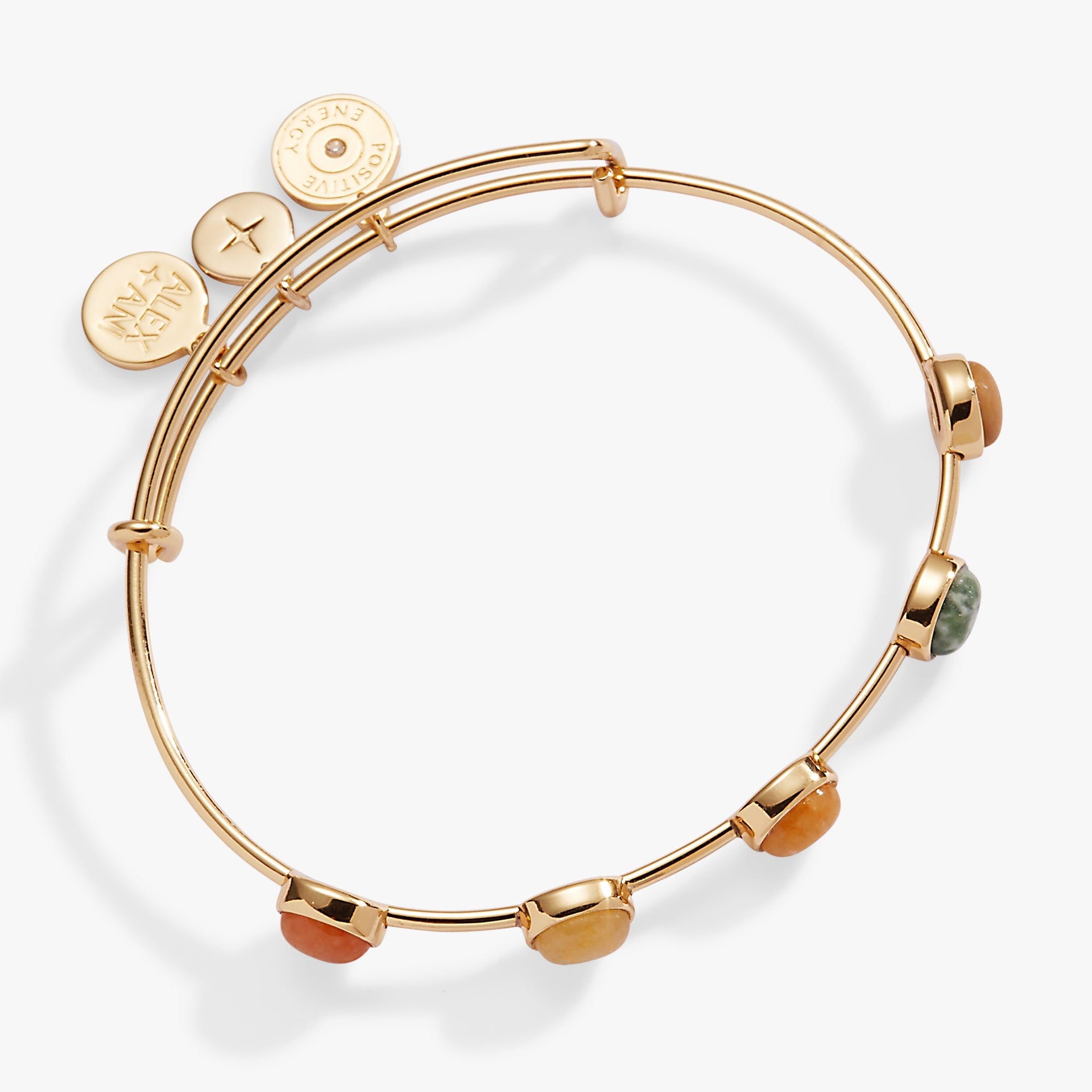 Gold-tone bangle featuring a row of multi-colored semi-precious gemstones including jade and jasper.