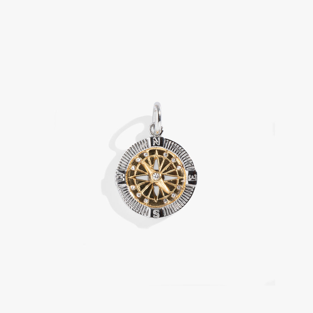 Two-tone silver and gold stainless steel compass charm with clear crystal accents