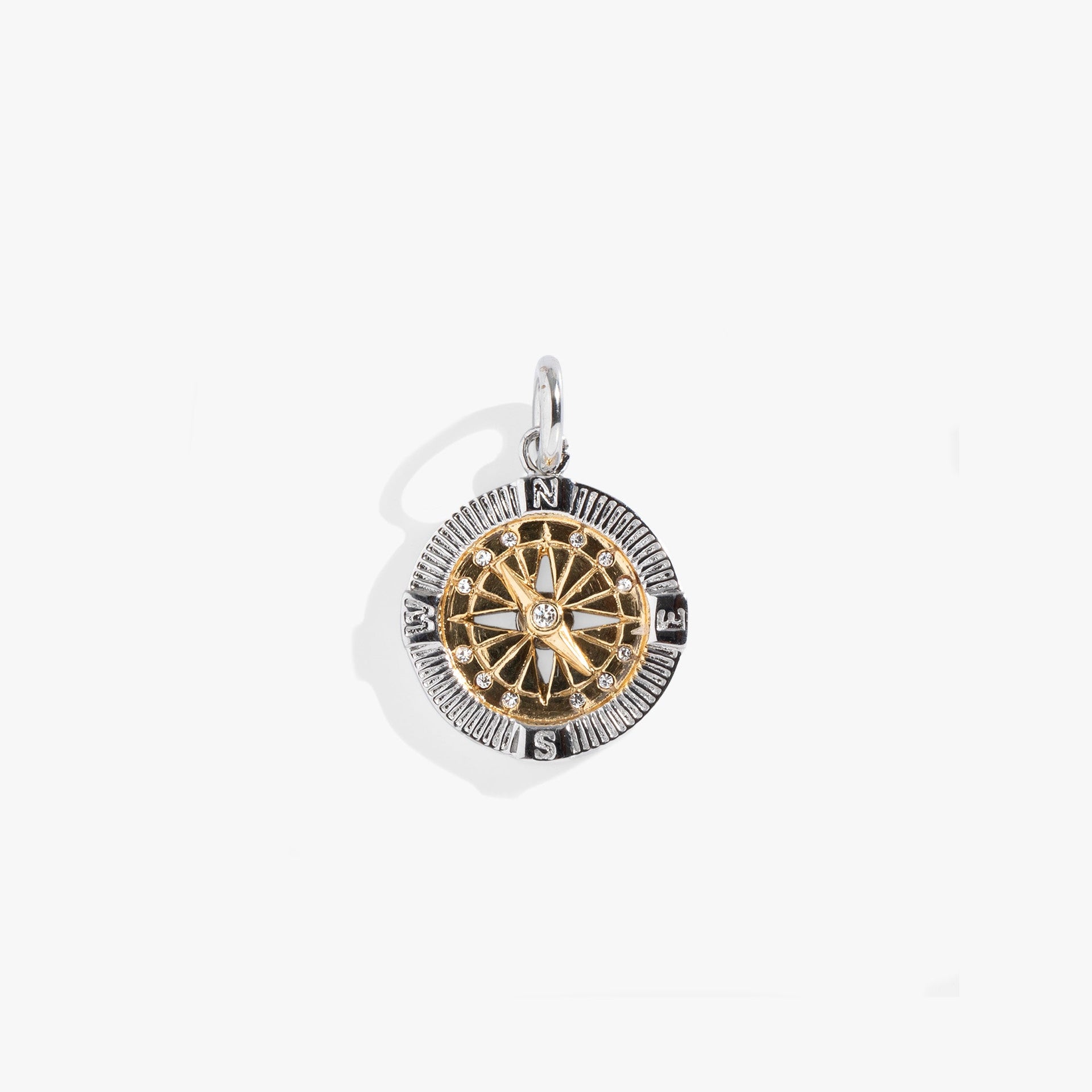 Two-tone silver and gold stainless steel compass charm with clear crystal accents