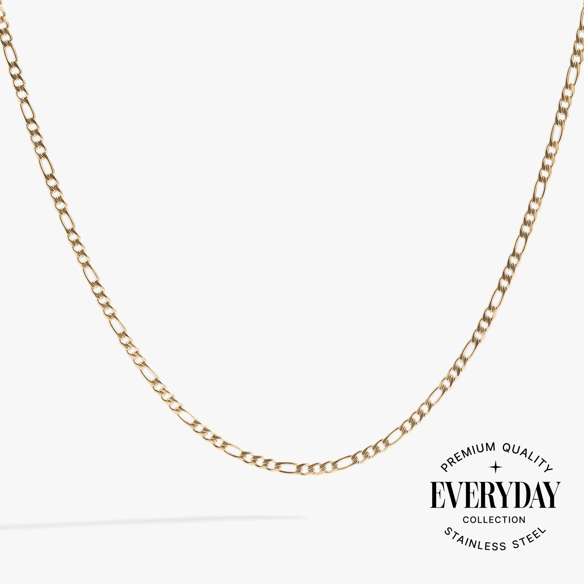 Figaro chain layering necklace in gold and silver stainless steel.