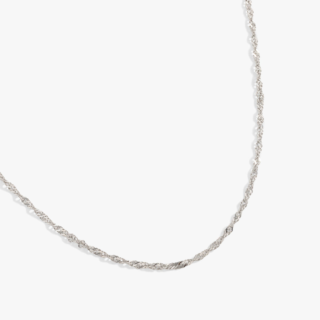 Silver stainless steel Singapore chain necklace with an intricate, shimmering link pattern.
