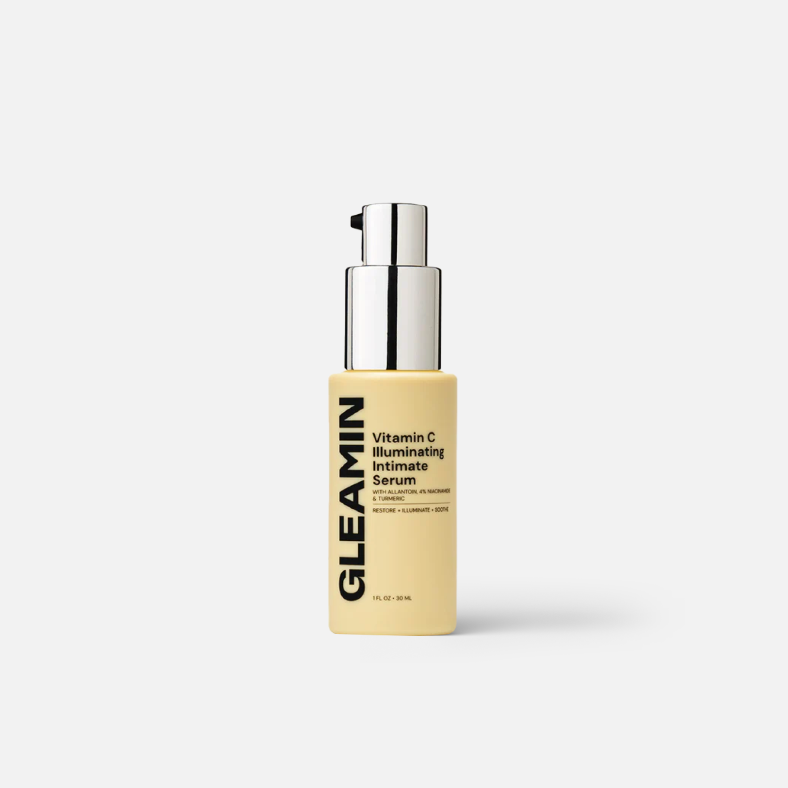 Gleamin Vitamin C Illuminating Intimate Serum bottle with pump top, showcasing brightening ingredients for sensitive skin.