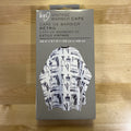 Ion Barber Styling Cape with a professional multi-pattern print and snap closure