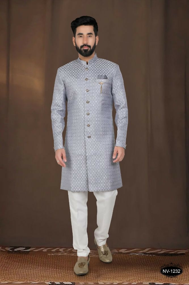 A stylish grey woven jacquard kurta paired with white pyjamas for boys