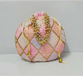 Multicolor geometric embroidered potli clutch for women with traditional indian bohemian aesthetic