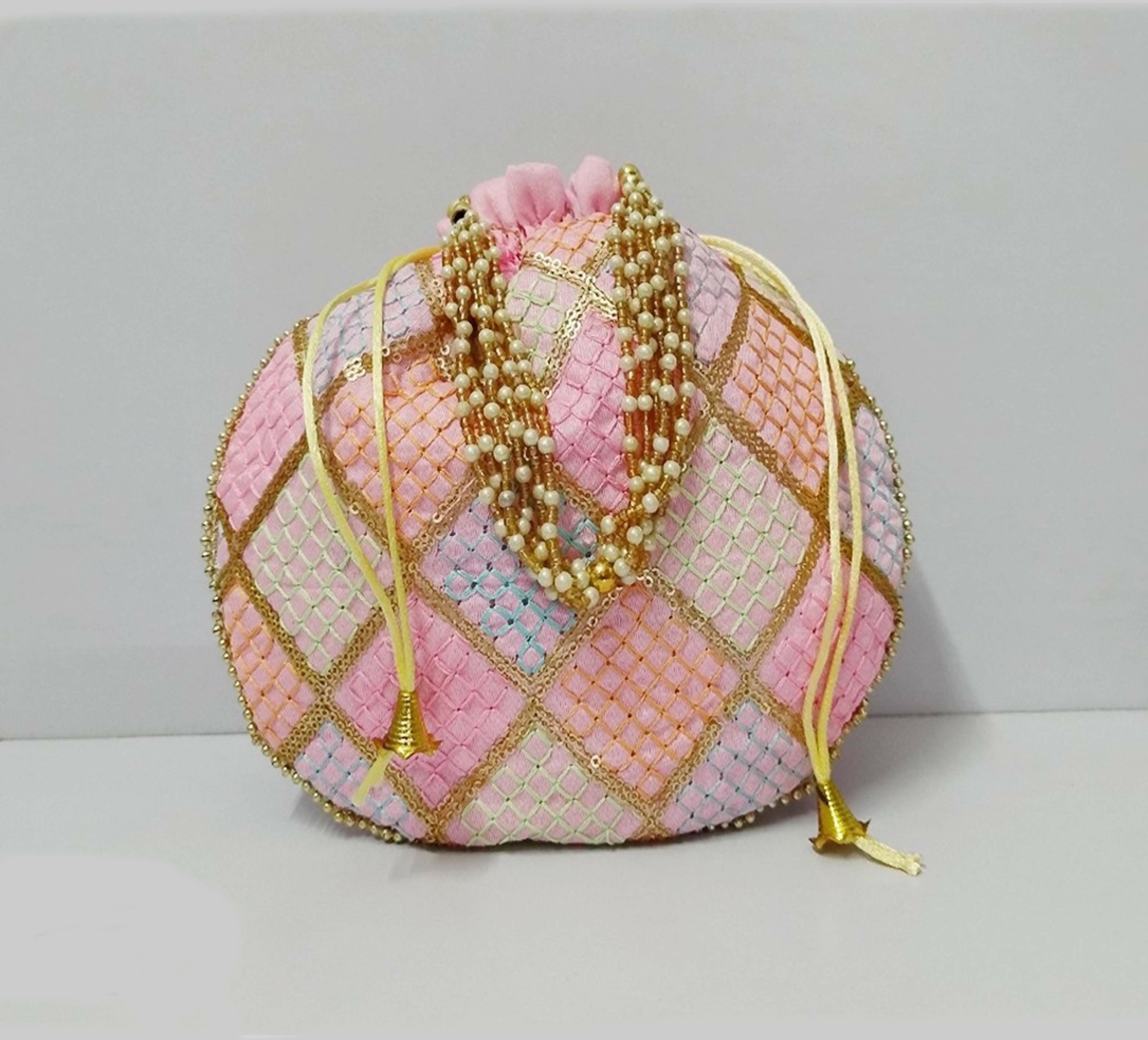 Multicolor geometric embroidered potli clutch for women with traditional indian bohemian aesthetic
