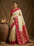 Cream soft silk saree with a vibrant pink blouse piece