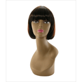 Close up of IVY synthetic wig in dark brown with subtle auburn highlights, shown on a neutral background.