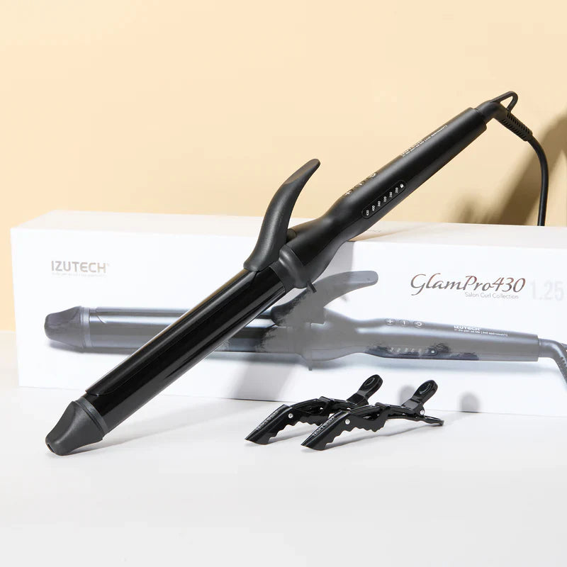 Professional 1.25 inch ceramic curling iron with extra long barrel for all hair lengths.