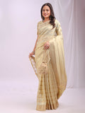 Elegant gold organza saree with a contrast yellow blouse piece draped gracefully