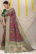 Wine Patola silk saree with Zari weaving and green blouse
