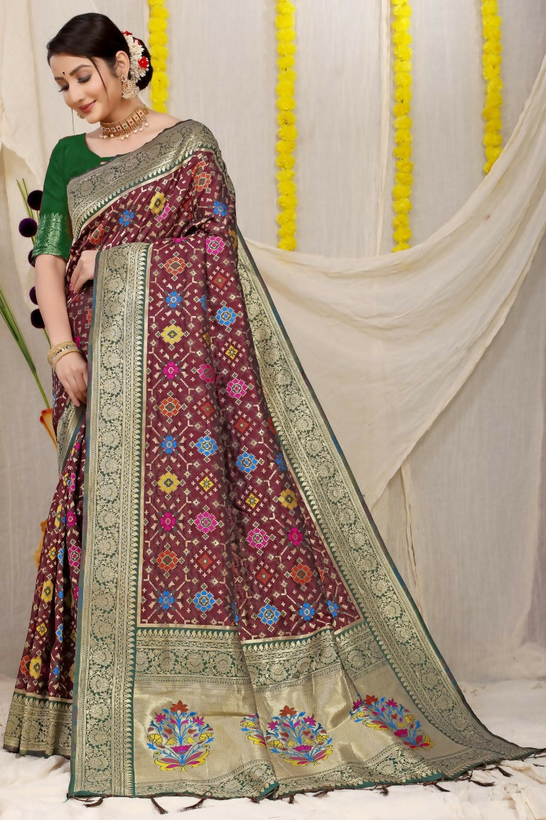 Wine Patola silk saree with Zari weaving and green blouse