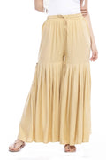 Girls golden rayon cotton wide-leg palazzo pants with bohemian ethnic design.