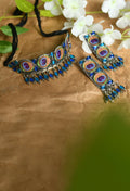 Oxidised silver-plated brass choker featuring a detailed peacock wings design