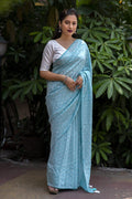 Sky Blue Poly Georgette Woven Design Saree with Unstitched Blouse - Hiral Fashion