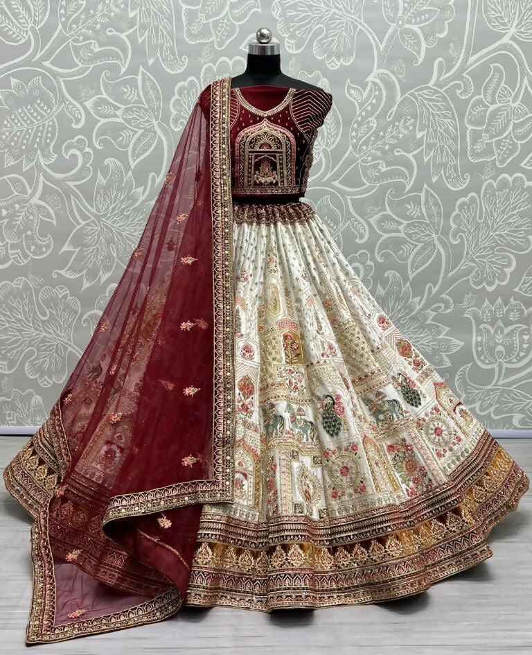 Elegant white velvet wedding lehenga with intricate dori and sequin embroidery