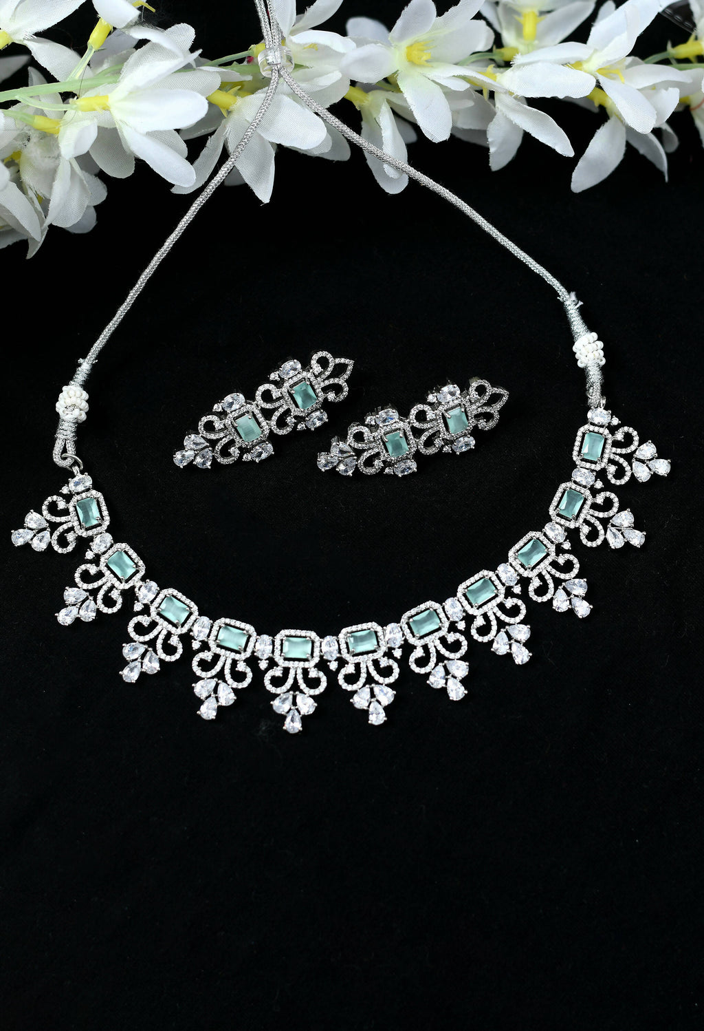 Silver-plated choker necklace set with American Diamonds and Pista Green stones