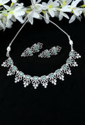 Silver-plated choker necklace set with American Diamonds and Pista Green stones