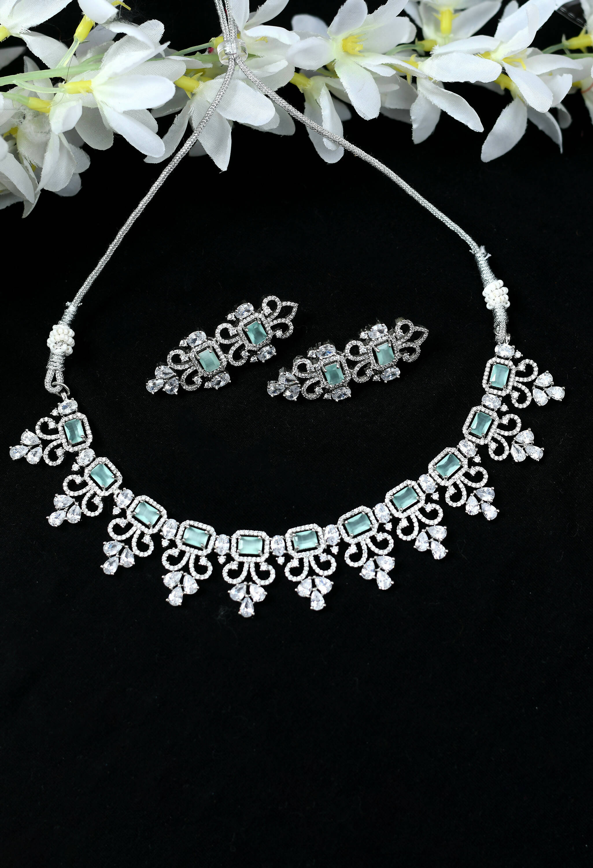Silver-plated choker necklace set with American Diamonds and Pista Green stones