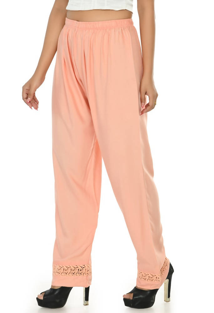 Peach colored rayon cotton straight-fit palazzo pants.
