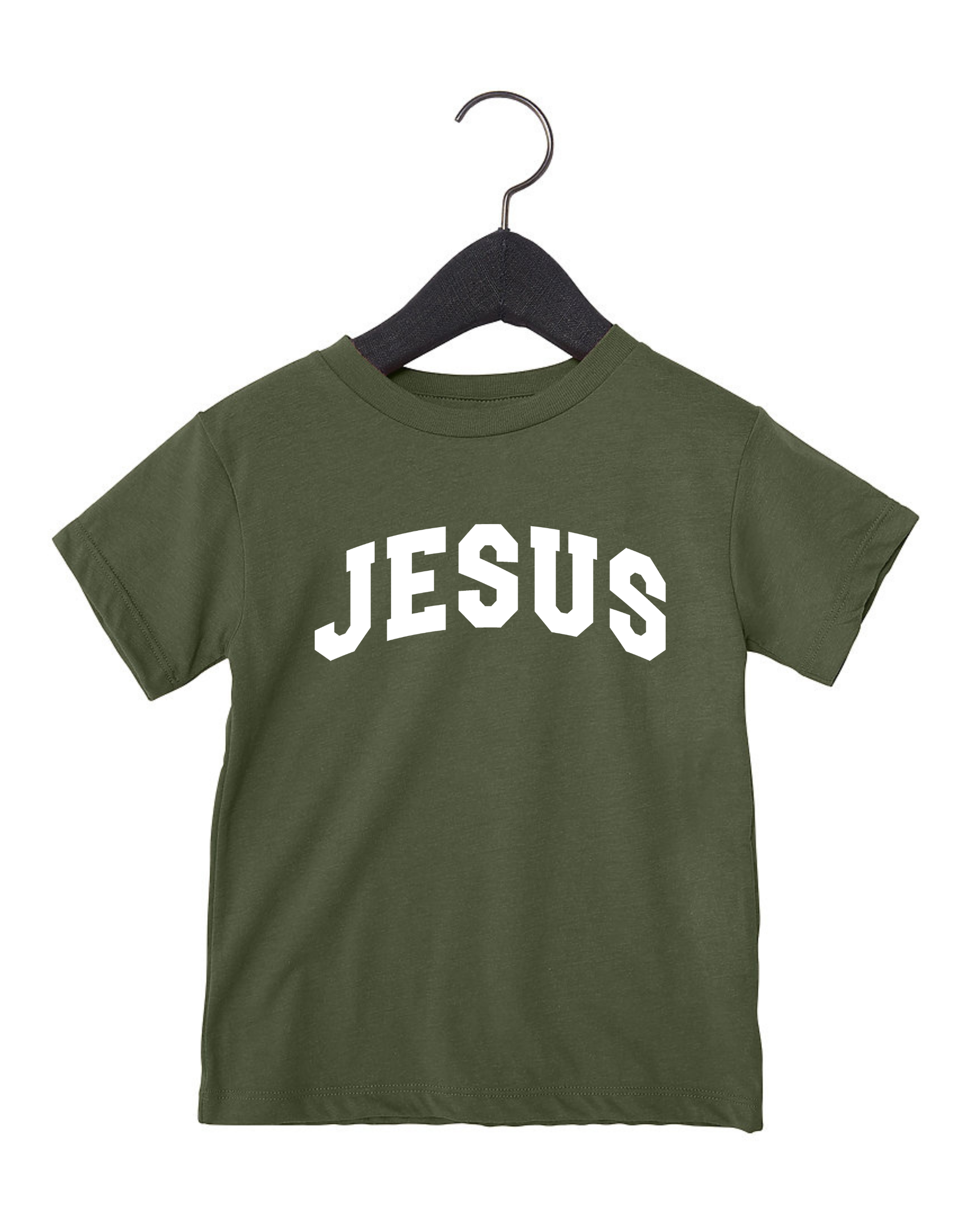 Close up of a festive Jesus themed graphic t-shirt in Christmas colors for children