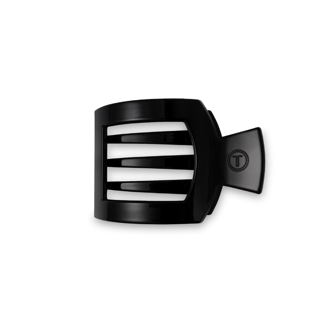 Small square hair clip in black against a clean backdrop