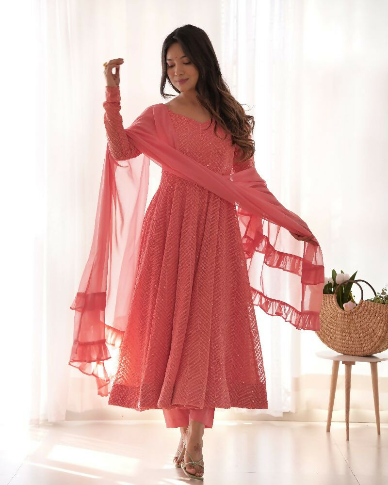 Elegant peach 3-piece kurta set in georgette fabric with delicate sequin embroidery work