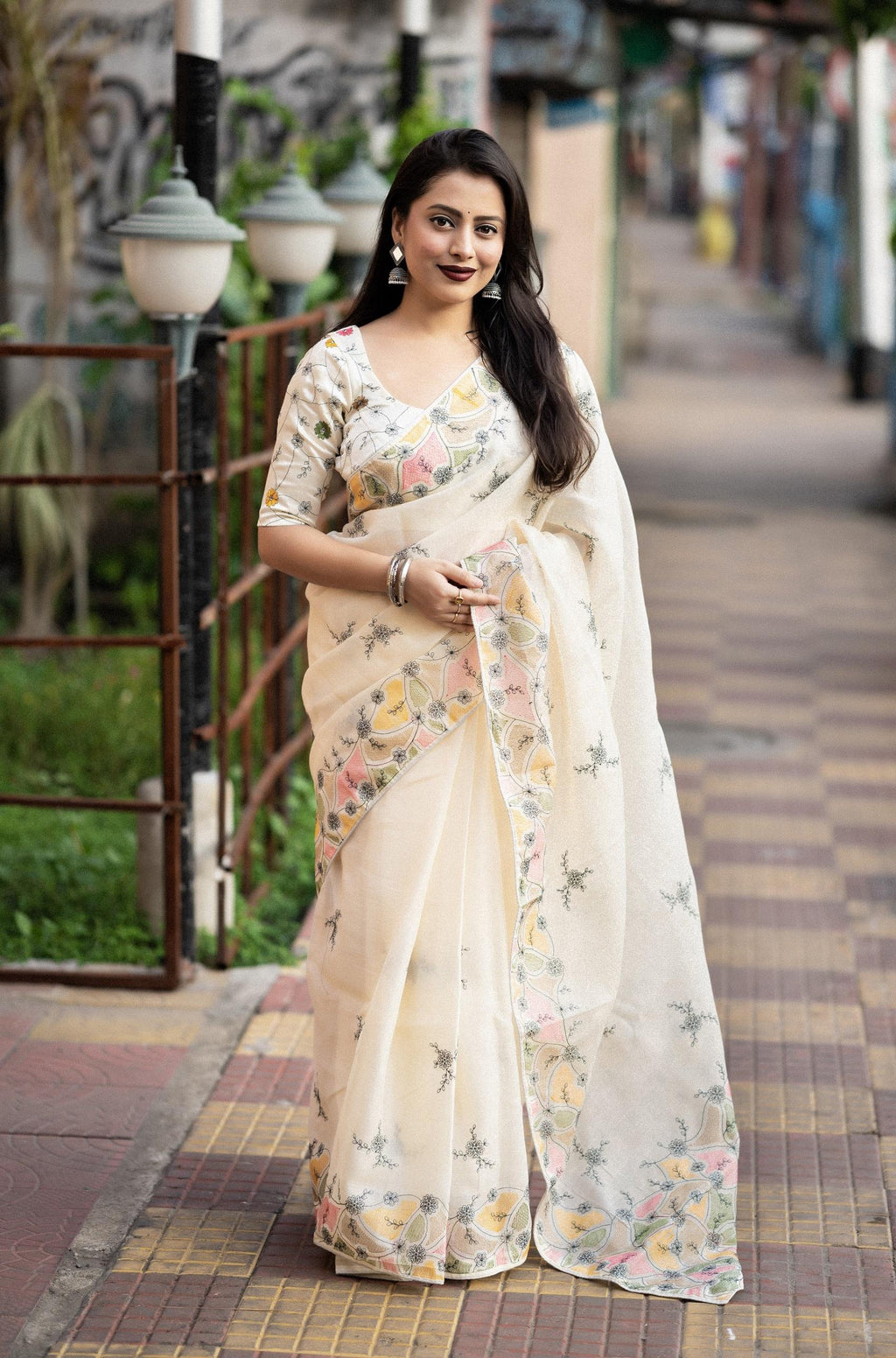 Cream Pure Linen Saree with Ethnic Motifs and Embroidered Blouse