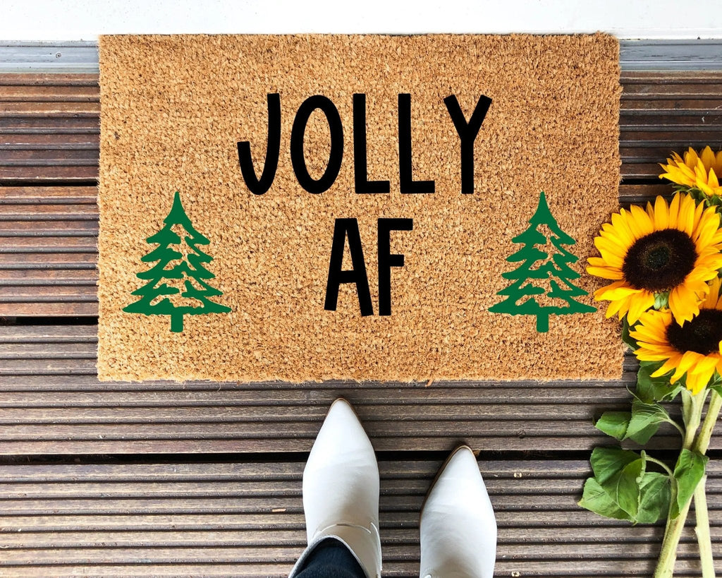 Solid brown Jolly AF holiday doormat