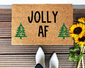 Solid brown Jolly AF holiday doormat