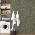 Close up of Josephine floral pattern removable wallpaper on a living room wall