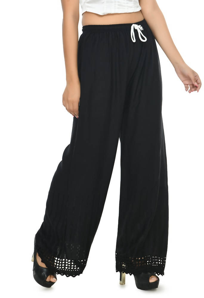 Black straight-fit palazzo pants featuring a decorative cut-work border